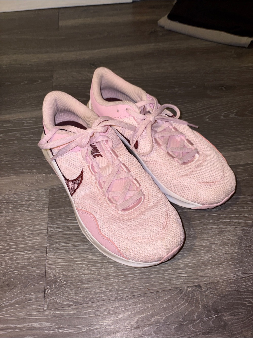 Nike Women’s Light Pink Mesh Running Shoes with Maroon Swoosh